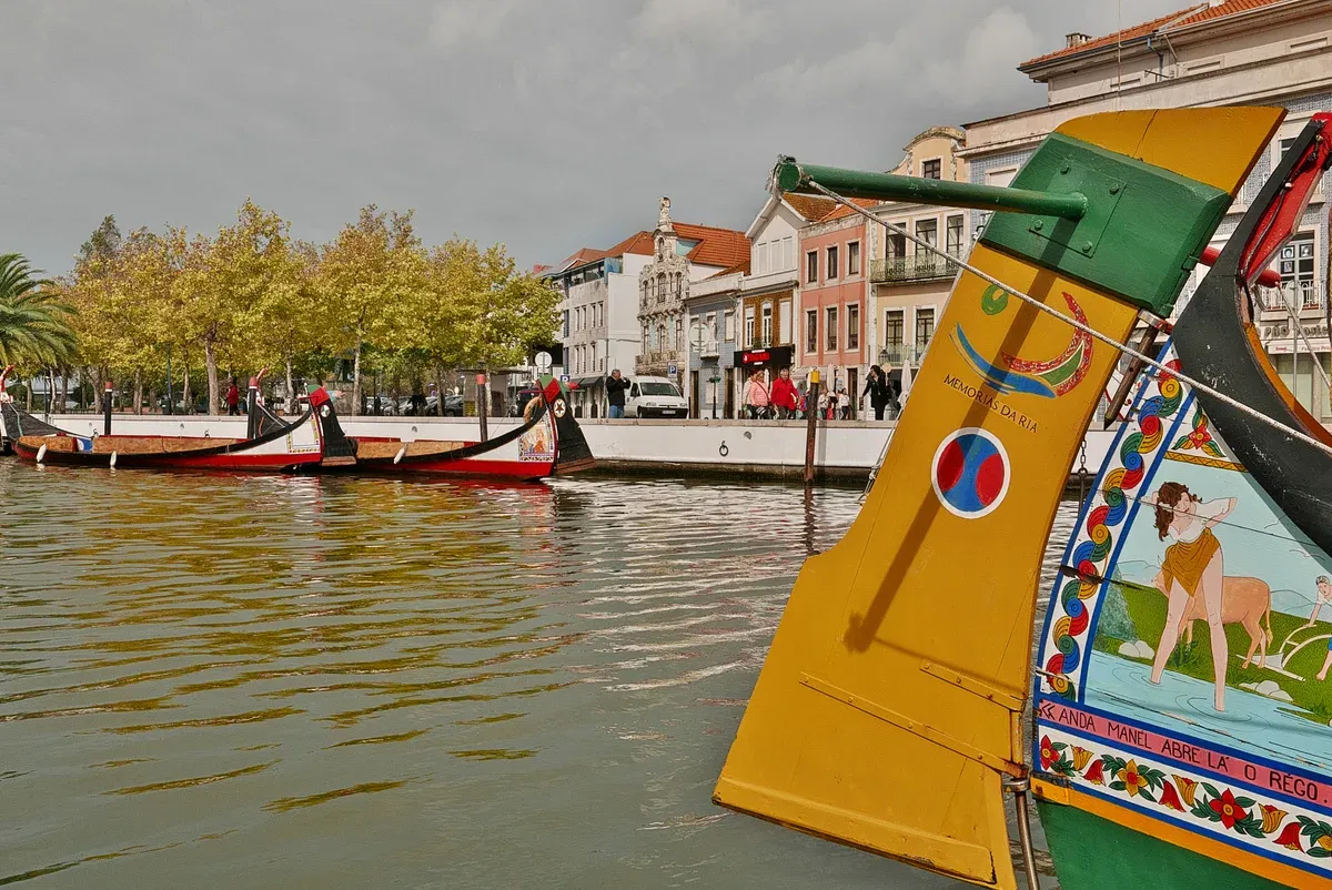 Painted moliceiro boats on the canal in Aveiro, a day trip from Porto by train