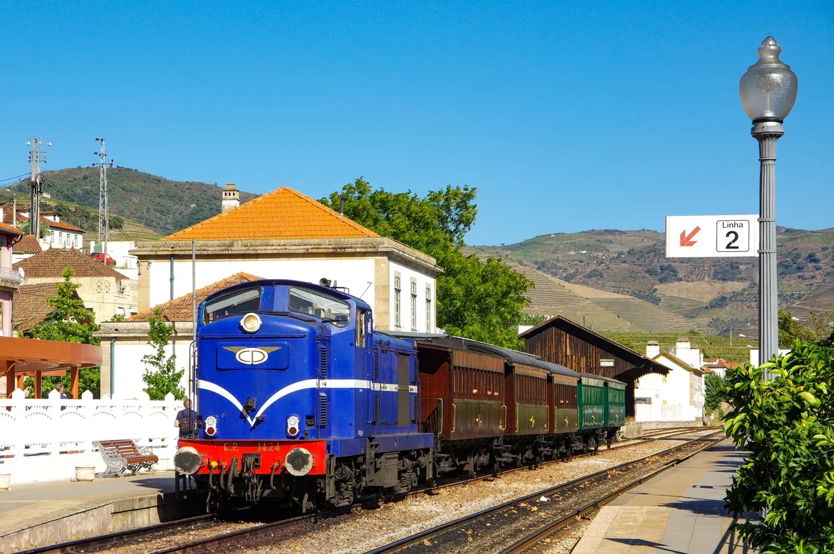 Historic Douro Train at Pinhão station on a complete Douro Valley wine tour from Porto