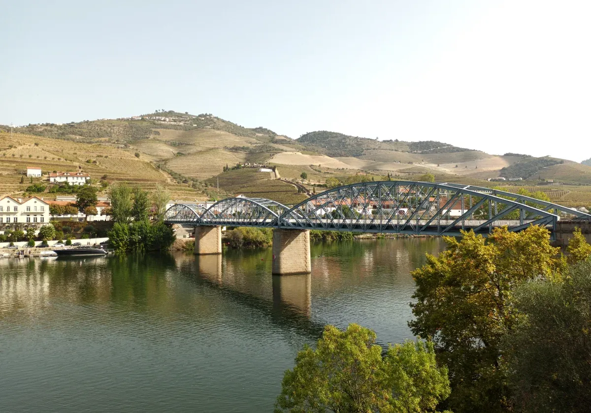 Iron bridge over the Douro at Pinhão on a Douro Valley wine tour from Porto